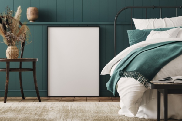 Bedroom with blue-green painted walls