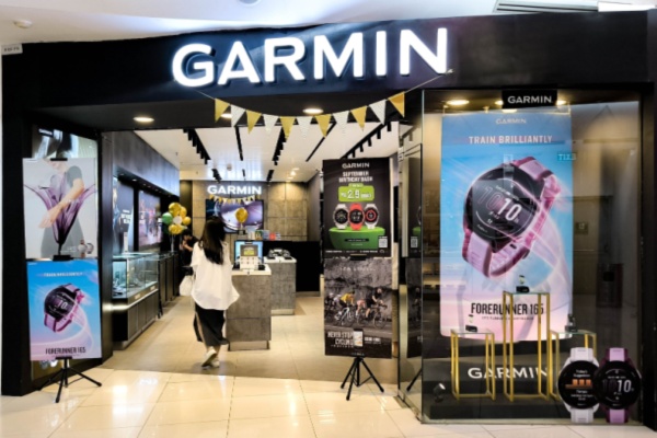 Entrance to Garmin store featuring smart watches