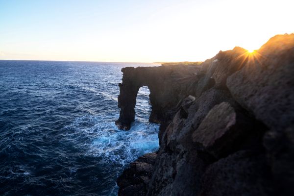 The Holei lava sea arch at sunset
