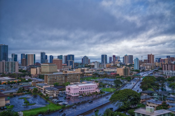 Aerial view of Honolulu, Oahu under storm clouds