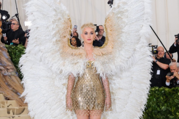 Katy Perry in sparkling gold dress and giant angel wings Met Gala