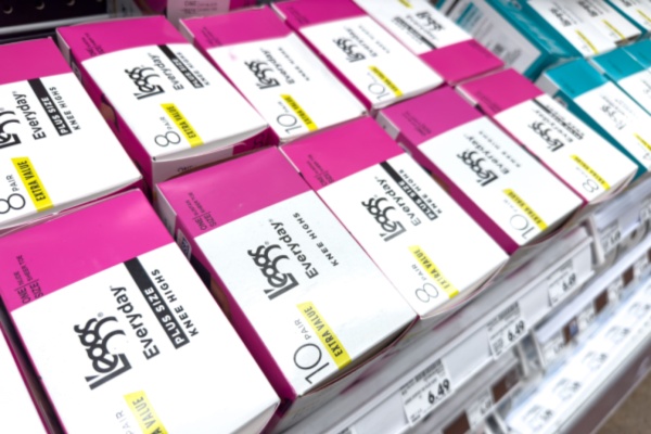 Row of boxes L'eggs tights on retail shelf