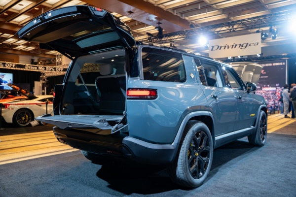 Back view of Rivian R2 midsize SUV EV with hatch open
