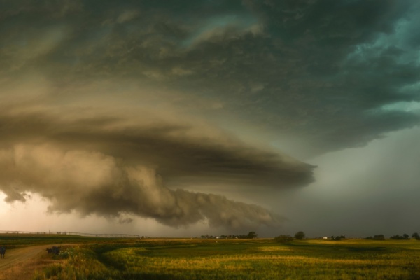 Stormy sky with clouds and green tinge over midwestern field
