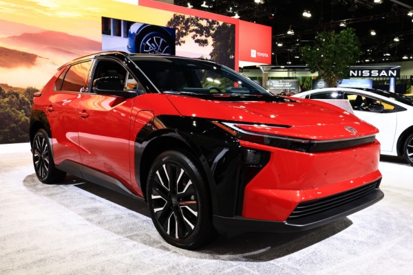 Red Toyota bZ electric compact SUV at Los Angeles car show